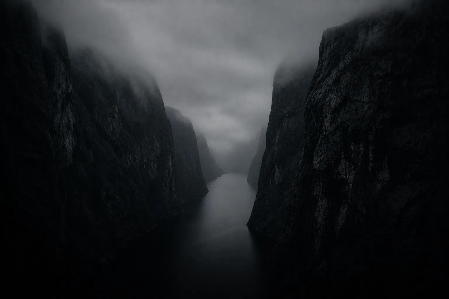 Narrow fjord with sheer rock walls